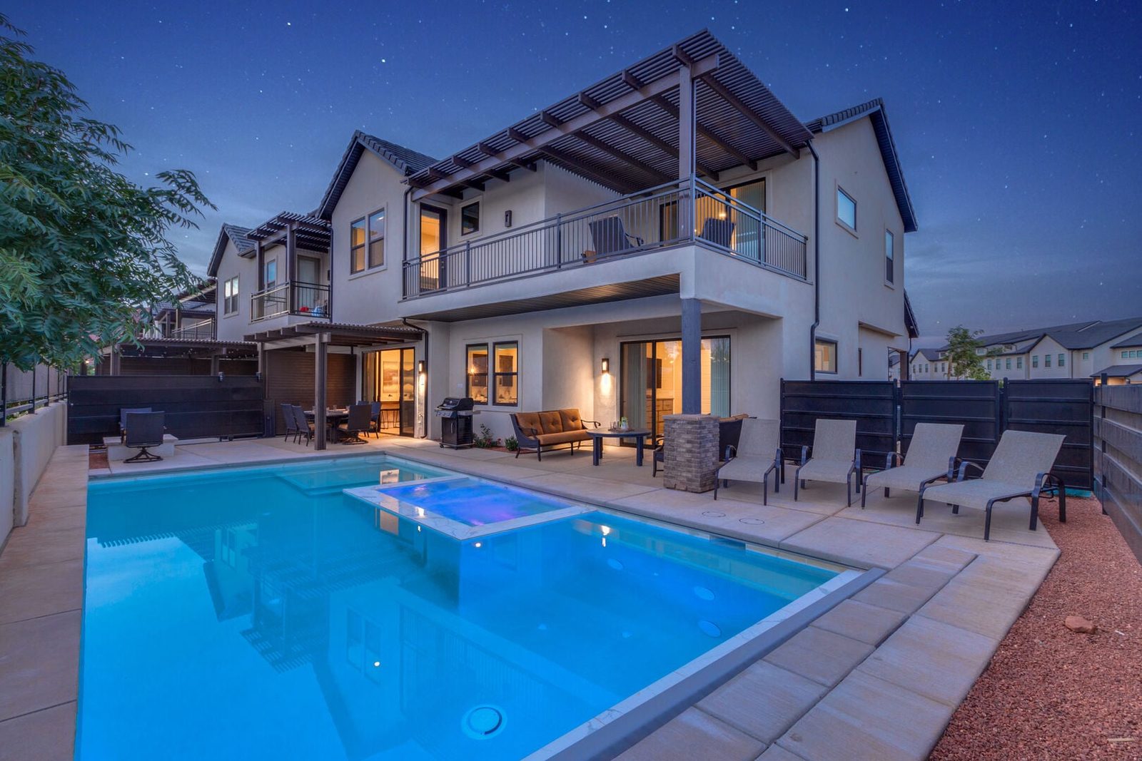 Private pool and spa behind Ocotillo Springs 48~Oasis at dusk