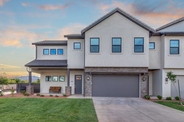 Front of Ocotillo Springs 48~Oasis two-story home with garage