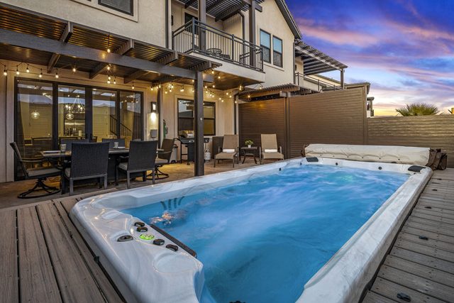 Private swim spa below the balcony at Ocotillo Springs 54 at dusk