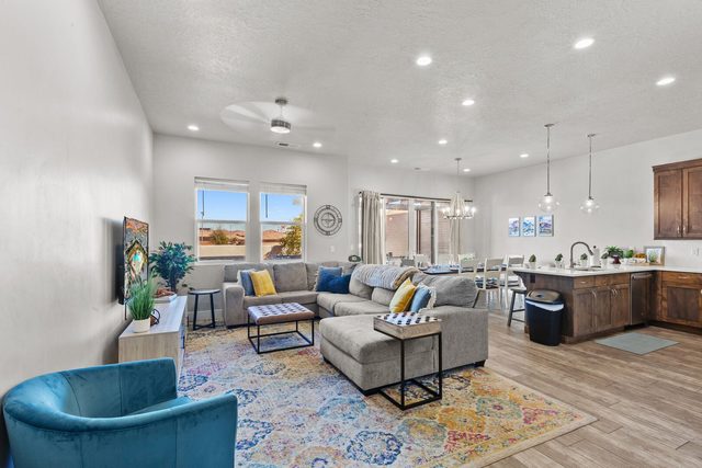 Open living room flowing into the kitchen and dining area