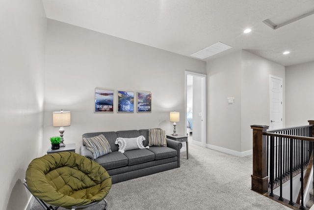 Upstairs loft lounge with sofa and papasan chair