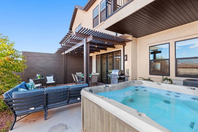 Private hot tub and outdoor seating behind Ocotillo Springs 69