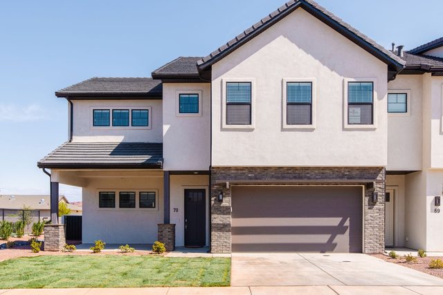 Two-story front exterior with garage and lawn at Ocotillo Springs 70