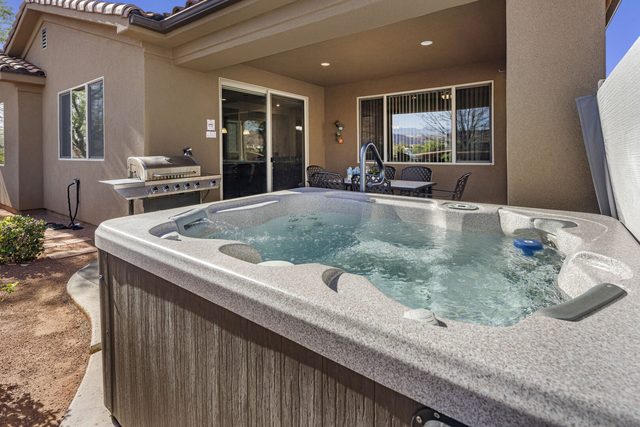 Private hot tub on the covered back patio at Paradise Village 10