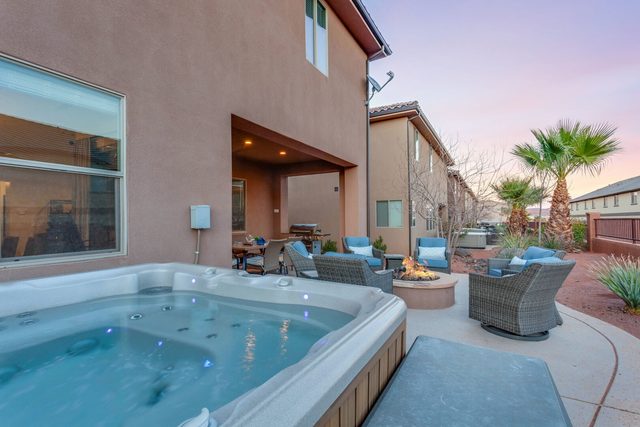 Private hot tub on the back patio at sunset