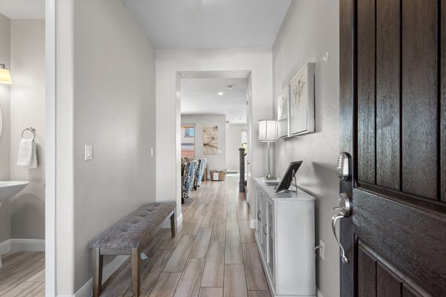 Front entry hallway with bench and console table
