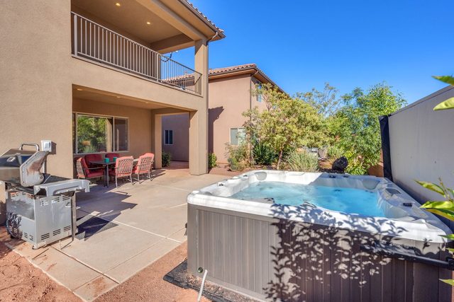Private hot tub and BBQ grill on the back patio