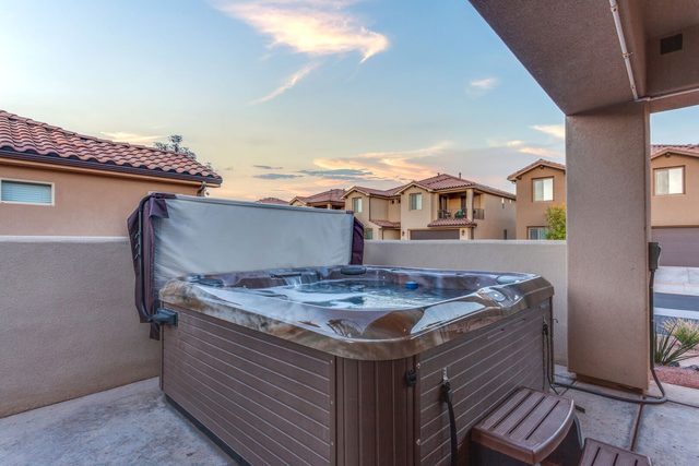 Private hot tub on the covered back patio at Paradise Village 111