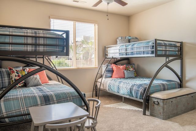 Bunk room with two twin-over-full bunks at Paradise Village 112