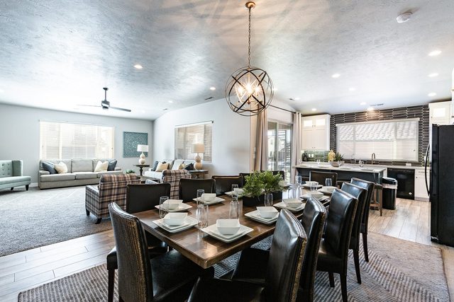 Open dining area for ten flowing into the kitchen and living room
