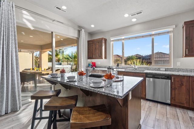 Kitchen island looking toward the covered patio doors