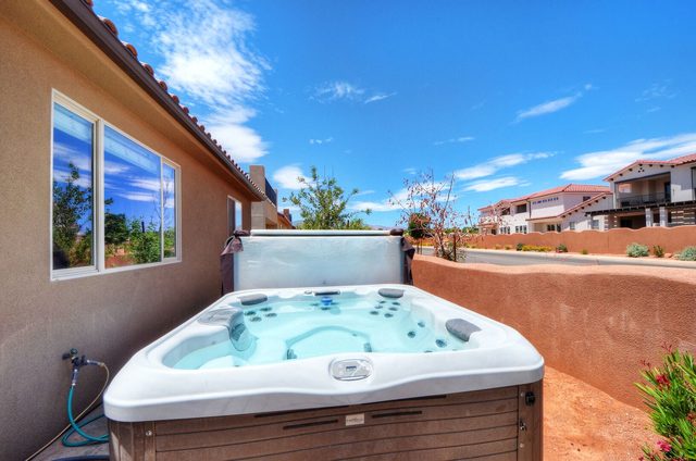 Private hot tub on the side patio at Paradise Village 120