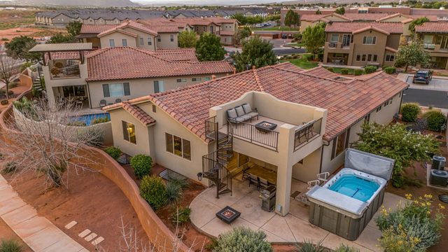 Aerial view of Paradise Village 16 with rooftop lounge and swim spa