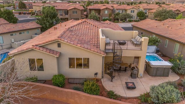 Aerial of Paradise Village 16 backyard, swim spa and rooftop deck
