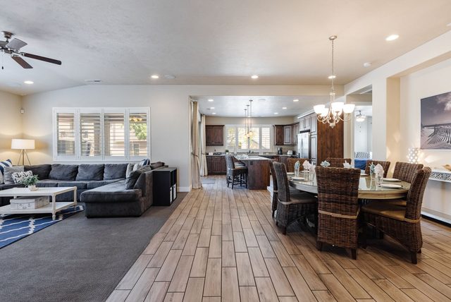 Open living and dining area with sectional at Paradise Village 28
