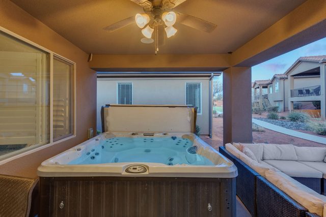 Private hot tub on the covered back patio at Paradise Village 28