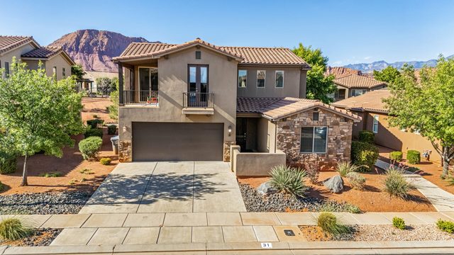 Two-story front exterior and driveway of home 31 at the retreat