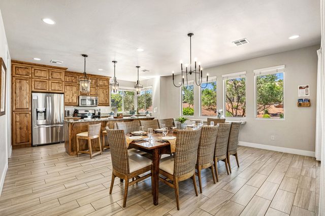 Home 31 dining table for ten next to the open kitchen