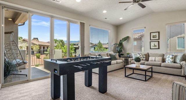 Home 32 loft lounge with foosball table and sofa