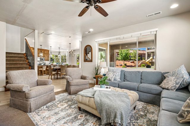 Living room open to the dining area and staircase