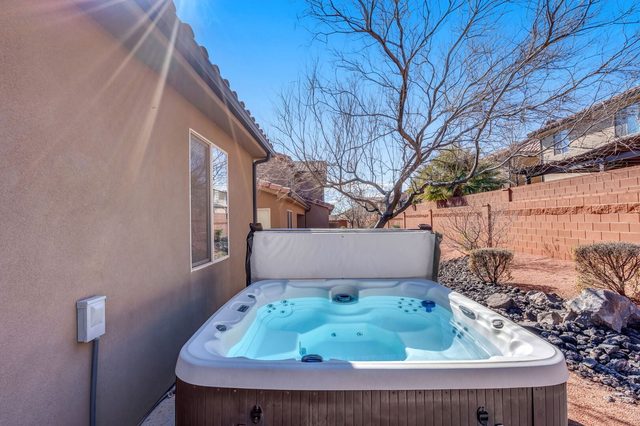 Private hot tub along the side yard at Paradise Village 58
