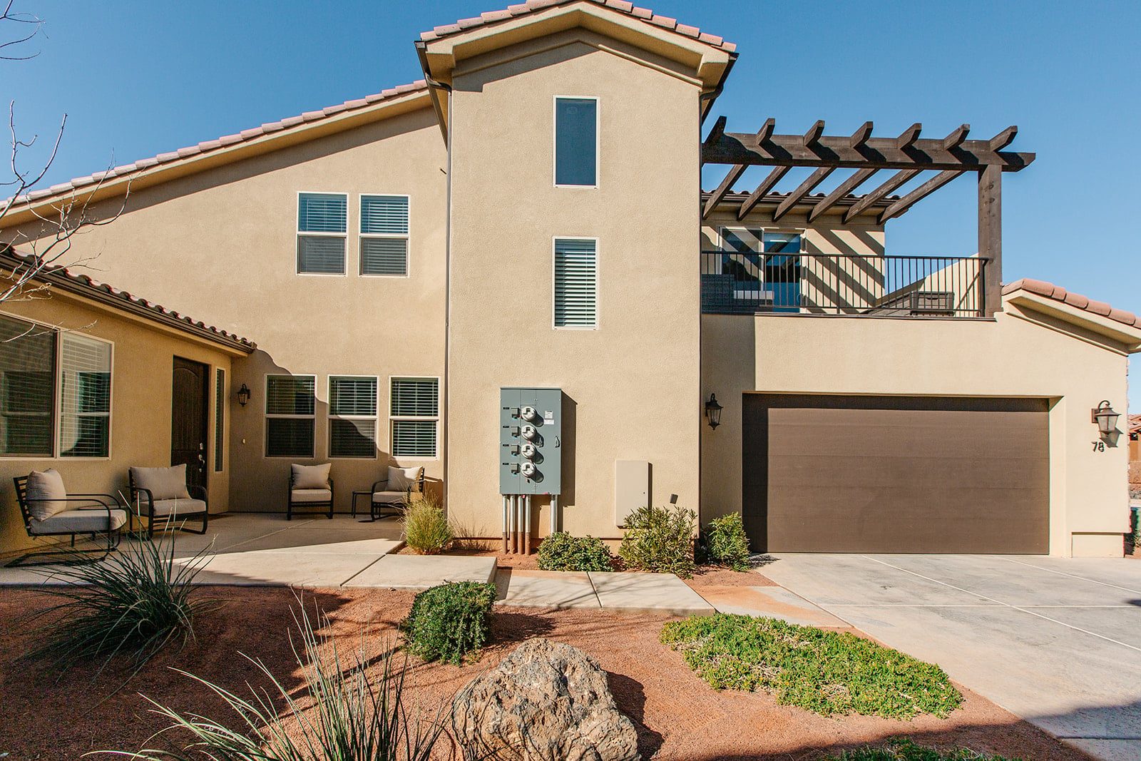 Front exterior of Paradise Village 78 with garage and rooftop balcony