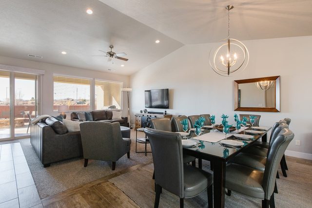 Dining table set for ten near the living room