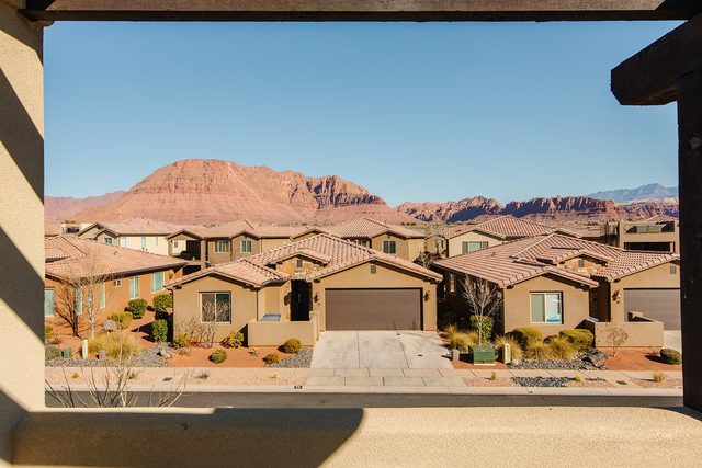 Red rock mountain view over Paradise Village rooftops from the balcony