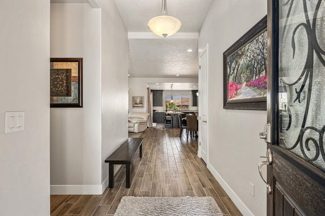 Entry hallway with bench leading to the great room