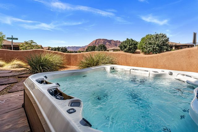 Private hot tub with red rock mountain view at Paradise Village 8