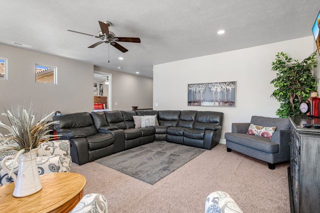 Upstairs family room sectional with side sofa and board game table