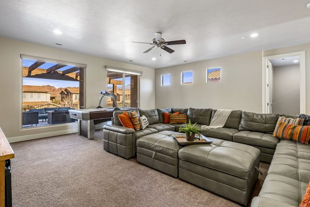 Upstairs loft with large sectional sofa at Paradise Village 84