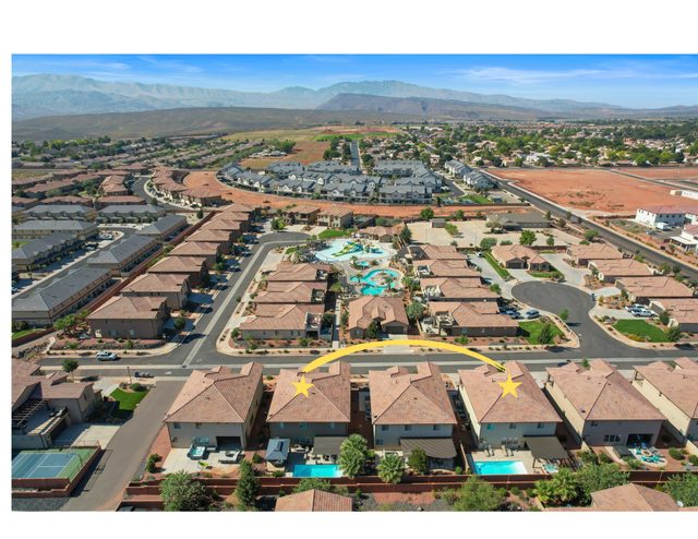 Aerial view of the two Paradise Village 94/96 Retreat homes and their backyard pools