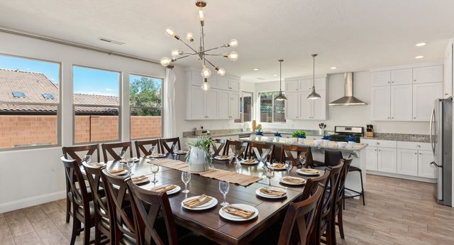 Home 94 dining table for twelve beside the open kitchen