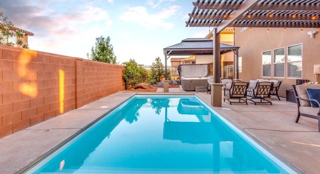 Home 96 private pool along the block wall with hot tub