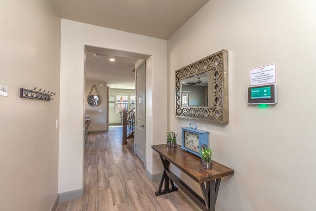 Entry hallway with console table and wall mirror