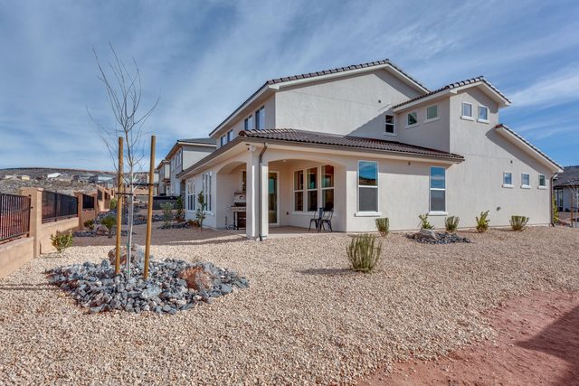 Backyard and rear of the two-story home at Paseos 1129