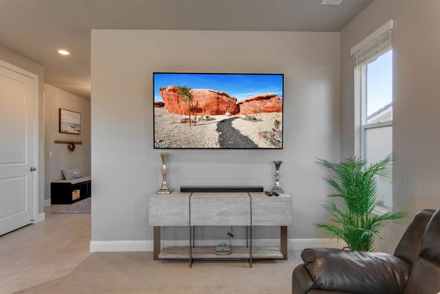 Living room TV console and leather recliner