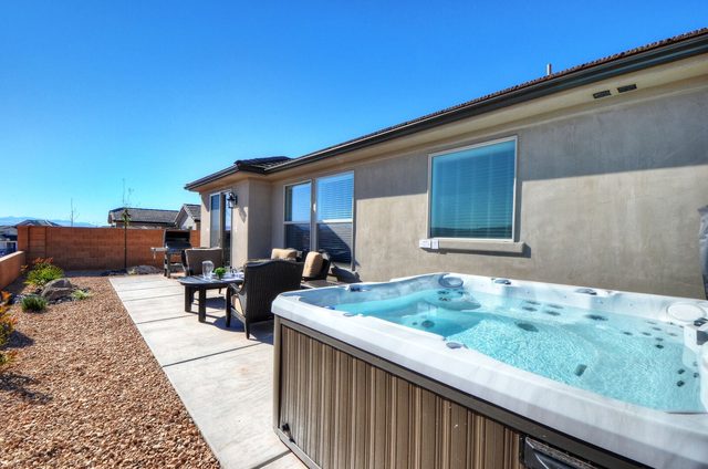 Private hot tub beside the patio at Paseos 1146