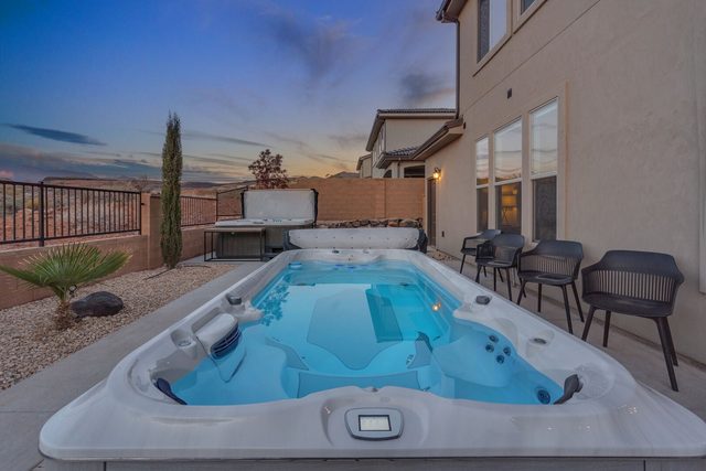 Private swim spa and hot tub in the Paseos 1149 backyard