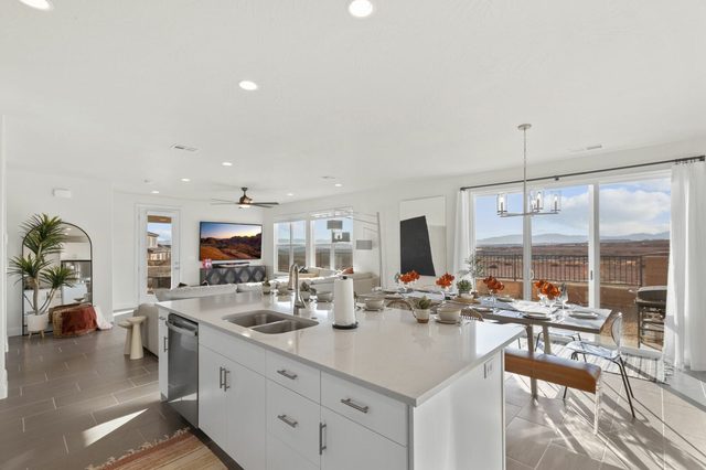 Open kitchen, dining and TV room on the main level