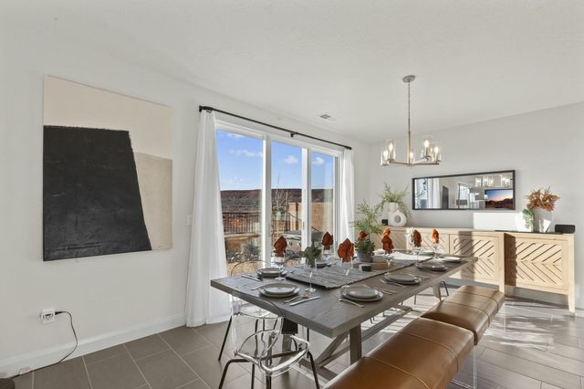 Dining table with bench seating for at least ten