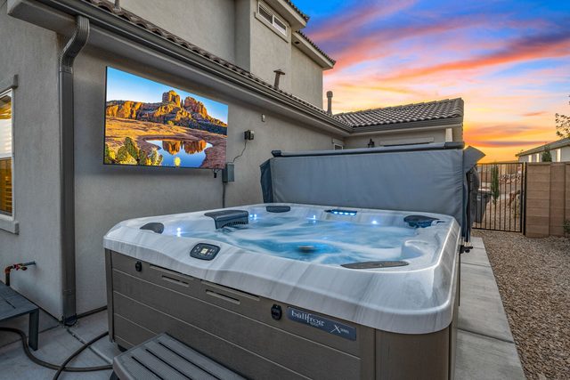 Private hot tub with outdoor TV on the patio