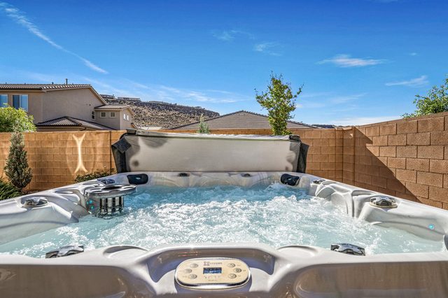 Private hot tub in the walled backyard at Paseos 1366