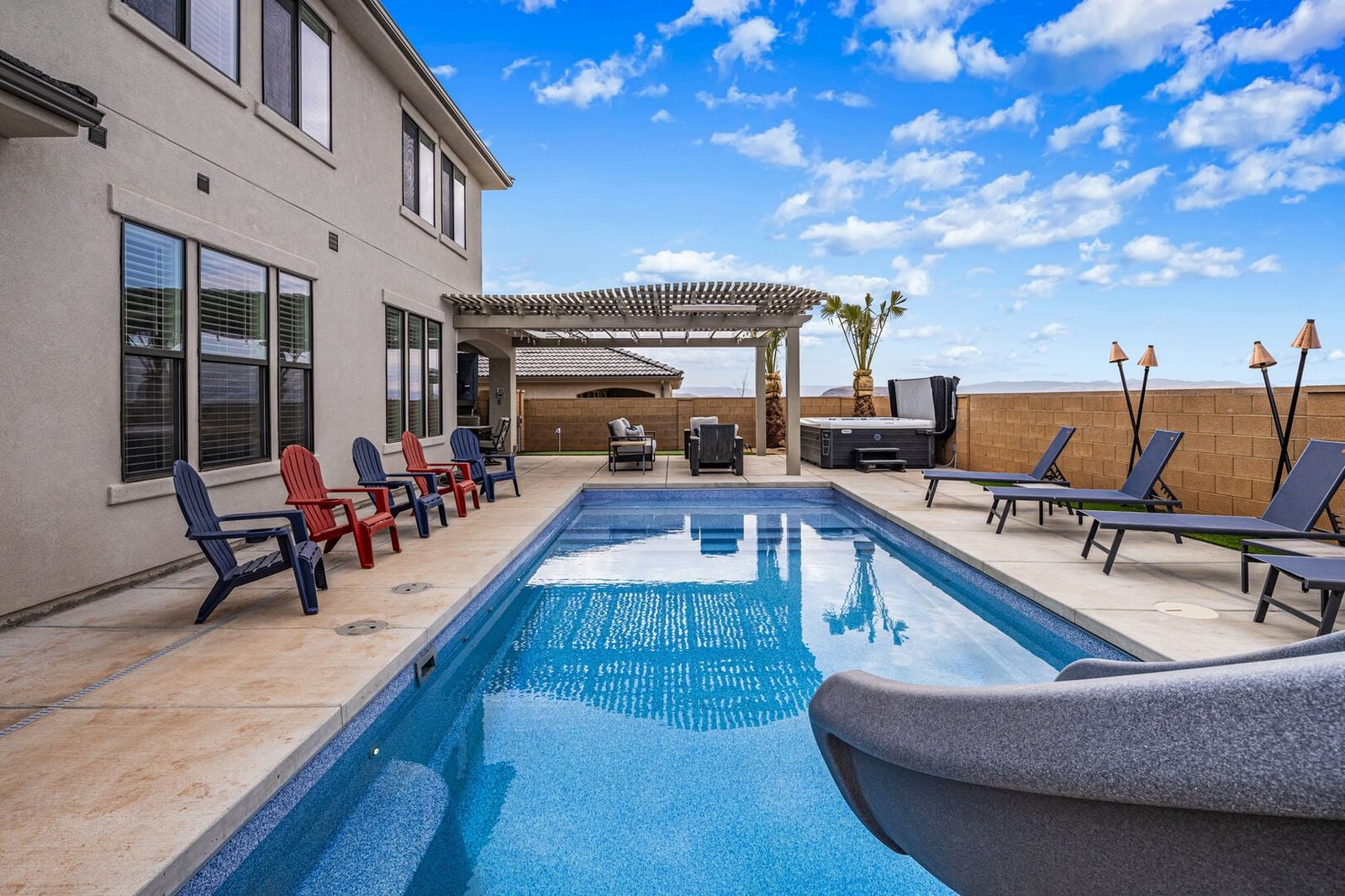 Private pool with slide and loungers at Paseos 1373/1342 Retreat