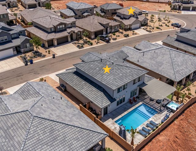 Aerial of both Paseos 1373/1342 Retreat homes with private pool
