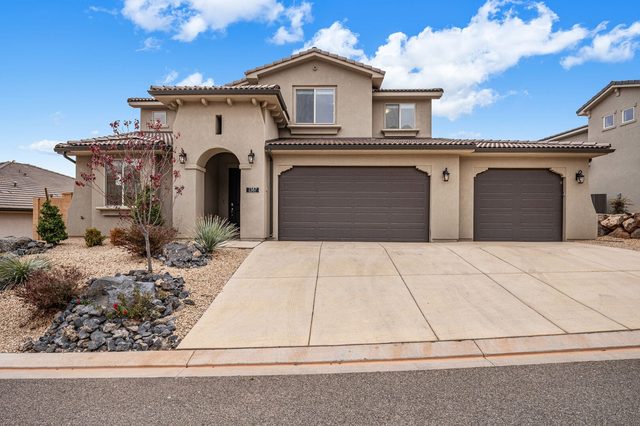 Front of Paseos 1387 two-story home with three-car garage