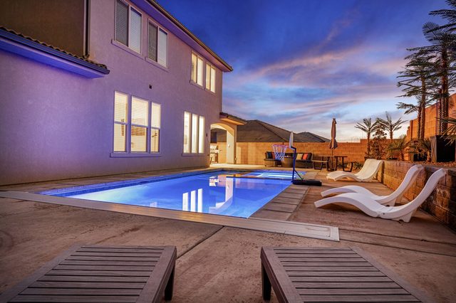 Private pool at twilight beside the home at Paseos 1387