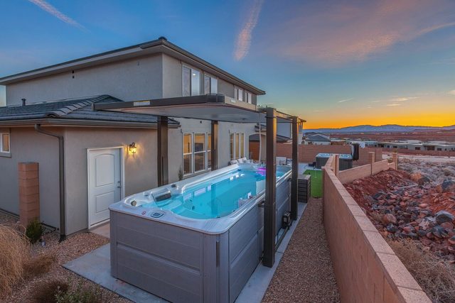 Private swim spa beside the house at sunset at Paseos 1433