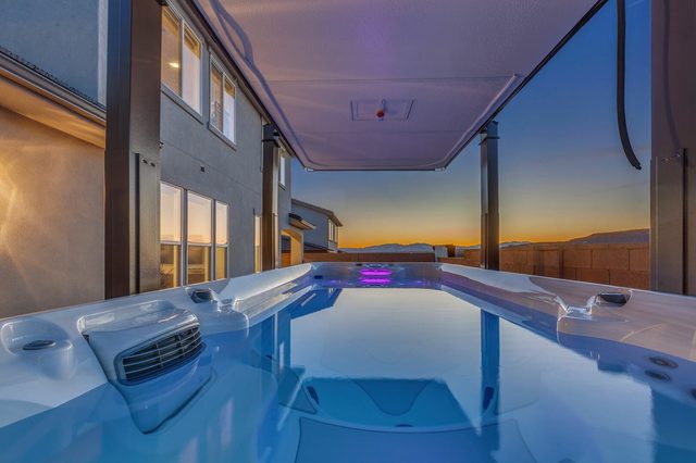 Swim spa water surface looking toward the sunset sky